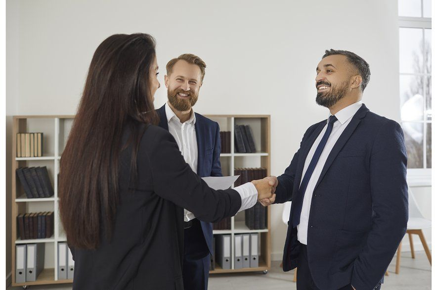 Professionals reviewing a project plan together